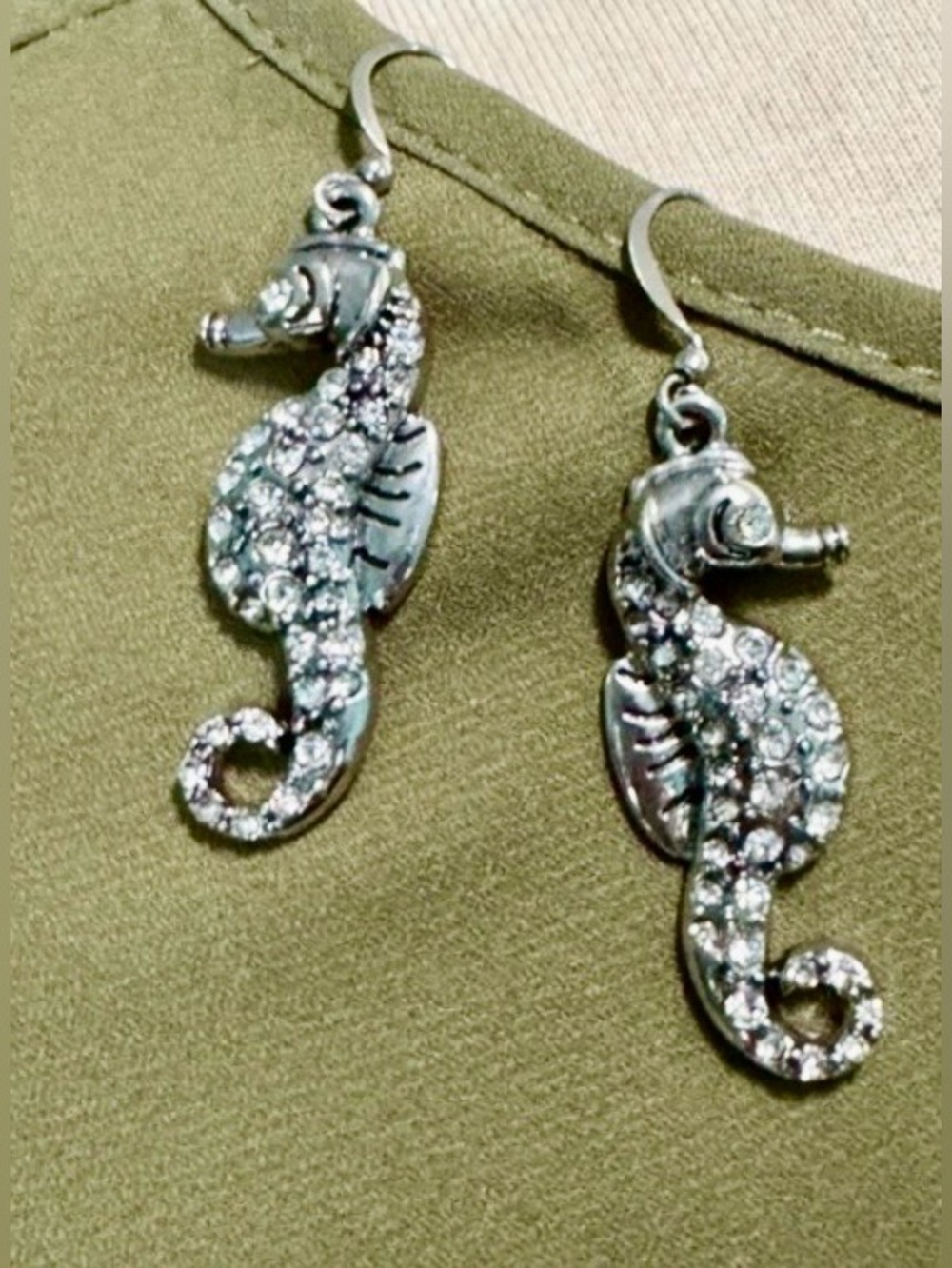 Rhinestone Seahorse Drop Earrings - Silver with shiny crystal.